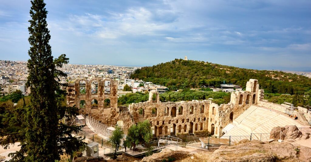 Historic Odeon of Herodes Atticus amphitheater in Athens, Greece, under a clear sky.